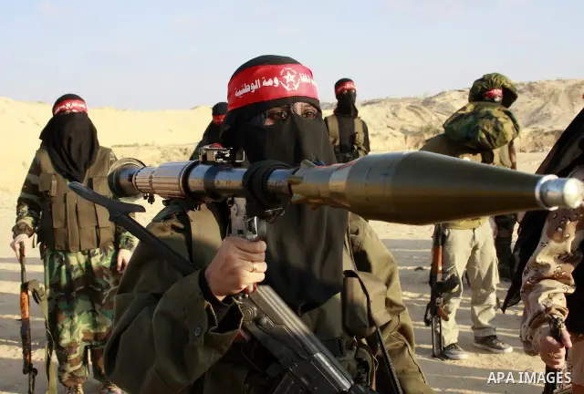 A Women militants from the Democratic Front for the Liberation of Palestine (DFLP) attend a military training session in Khan Younis, southern Gaza Strip, Monday, Aug. 20, 2009. Founded in 1969 the DFLP is a Palestinian...