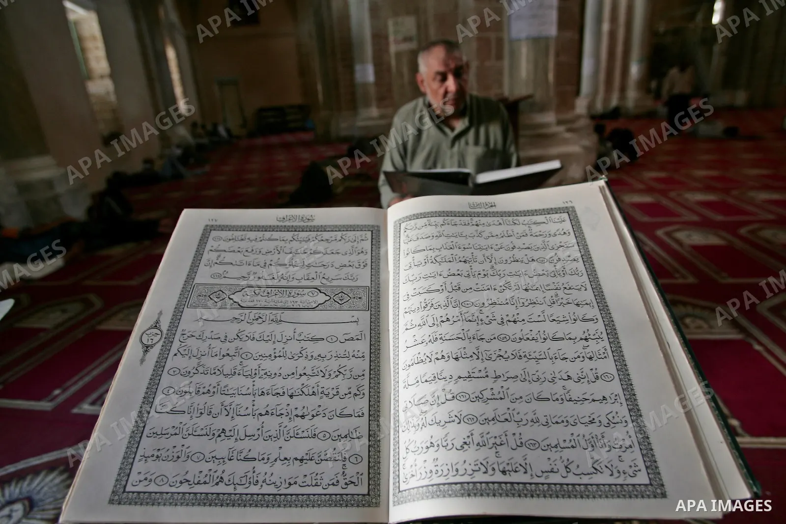 A Palestinians read the holy Koran at a mosque, on the first day of the holy fasting month Ramadan in Gaza city on August 22, 2009. The start of the ninth and holiest month of the Muslim calendar is traditionally determi...