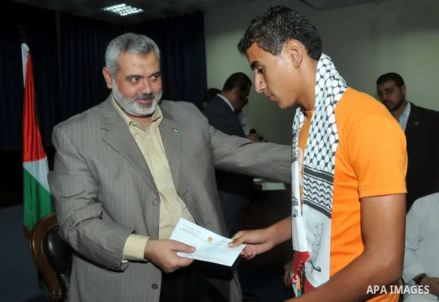 Palestinian Prime Minister of Hamas Ismail Haniyeh,honors AL_Shatea Services Club after his winning in the championship in Gaza City on Oct 20,2009. Photo by Mohammed Ostaz