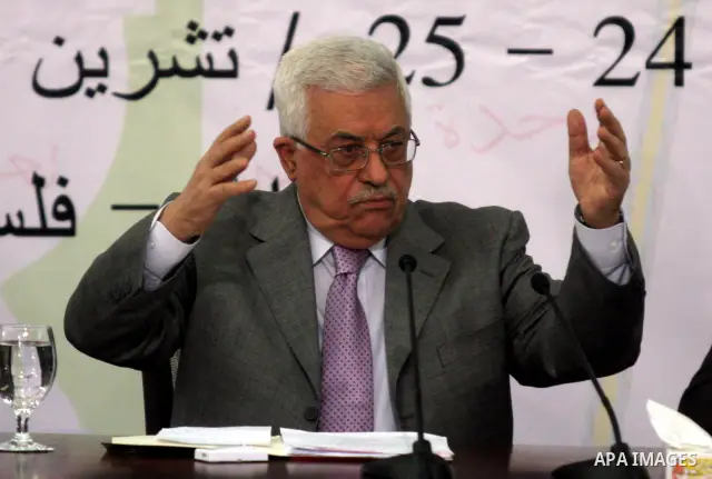 Palestinian president Mahmud Abbas delivers a speech to the Palestinian people in the West Bank city of Ramallah, on October 24, 2009. Palestinian President Mahmoud Abbas has signed a decree calling for Palestinian elect...