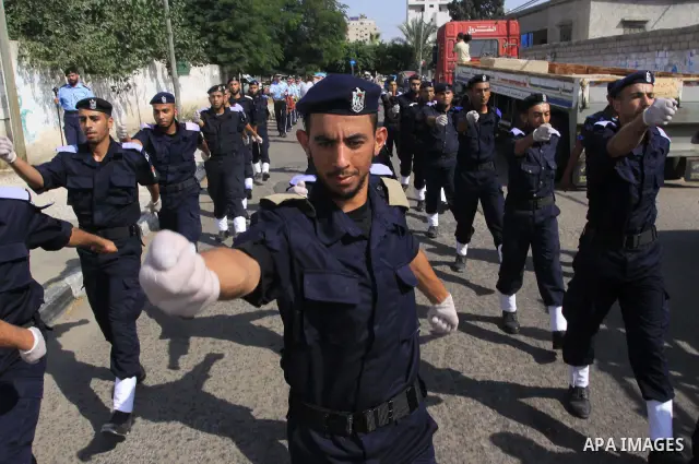 A members of Hamas police march during their graduation ceremony in Gaza city on Oct 25, 2009. Photo By Mohammed Asad