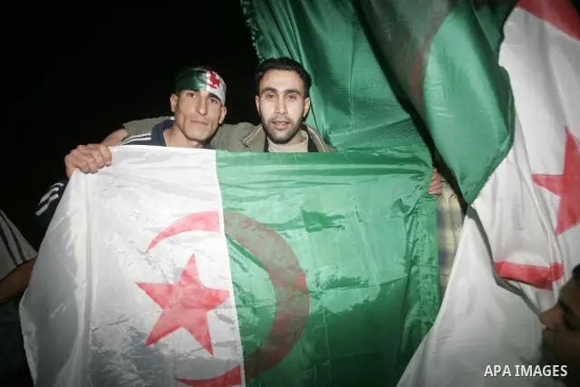Palestinian football fans celebrate in the city of Khan Younis in southern Gaza Strip after Algeria beat Egypt in their 2010 World Cup African zone group C on November 18, 2009. Algeria defeated Egypt 1-0 in Khartoum, Su...