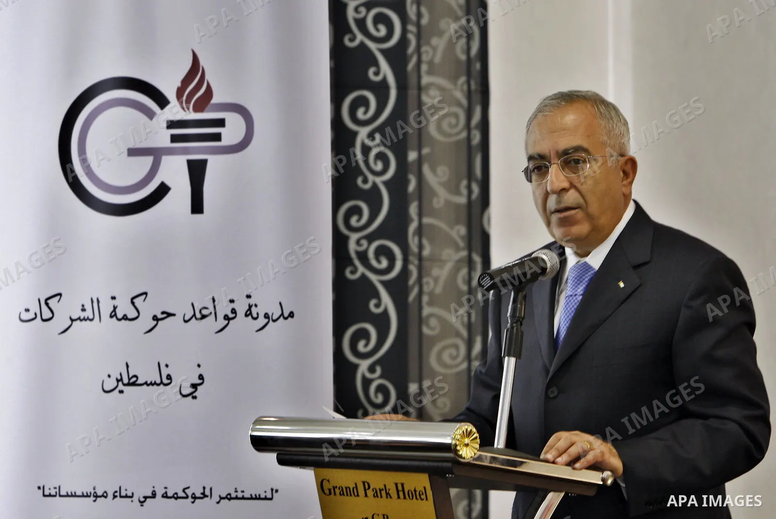Palestinian Prime Minister Salam Fayyad attends the conference of developing the companies in Palestine in the West Bank city of Ramallah on Nov 18, 2009. Photo by Mustafa Abu Dayeh \ pool