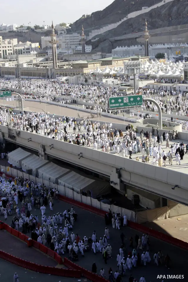 Muslim pilgrims walk near Mount Arafat, southeast of the Saudi city of Mecca on November 28, 2009. Some 2.5 million Muslims from more than 160 countries converge annually on the Islamic cities of Mecca and Medina in west...