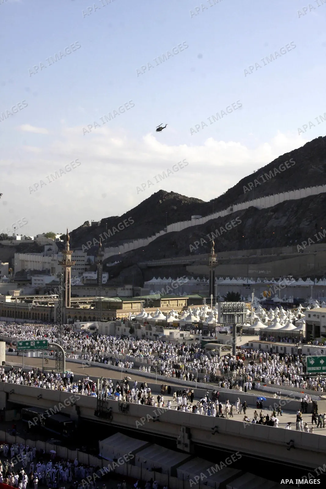 Muslim pilgrims walk near Mount Arafat, southeast of the Saudi city of Mecca on November 28, 2009. Some 2.5 million Muslims from more than 160 countries converge annually on the Islamic cities of Mecca and Medina in west...