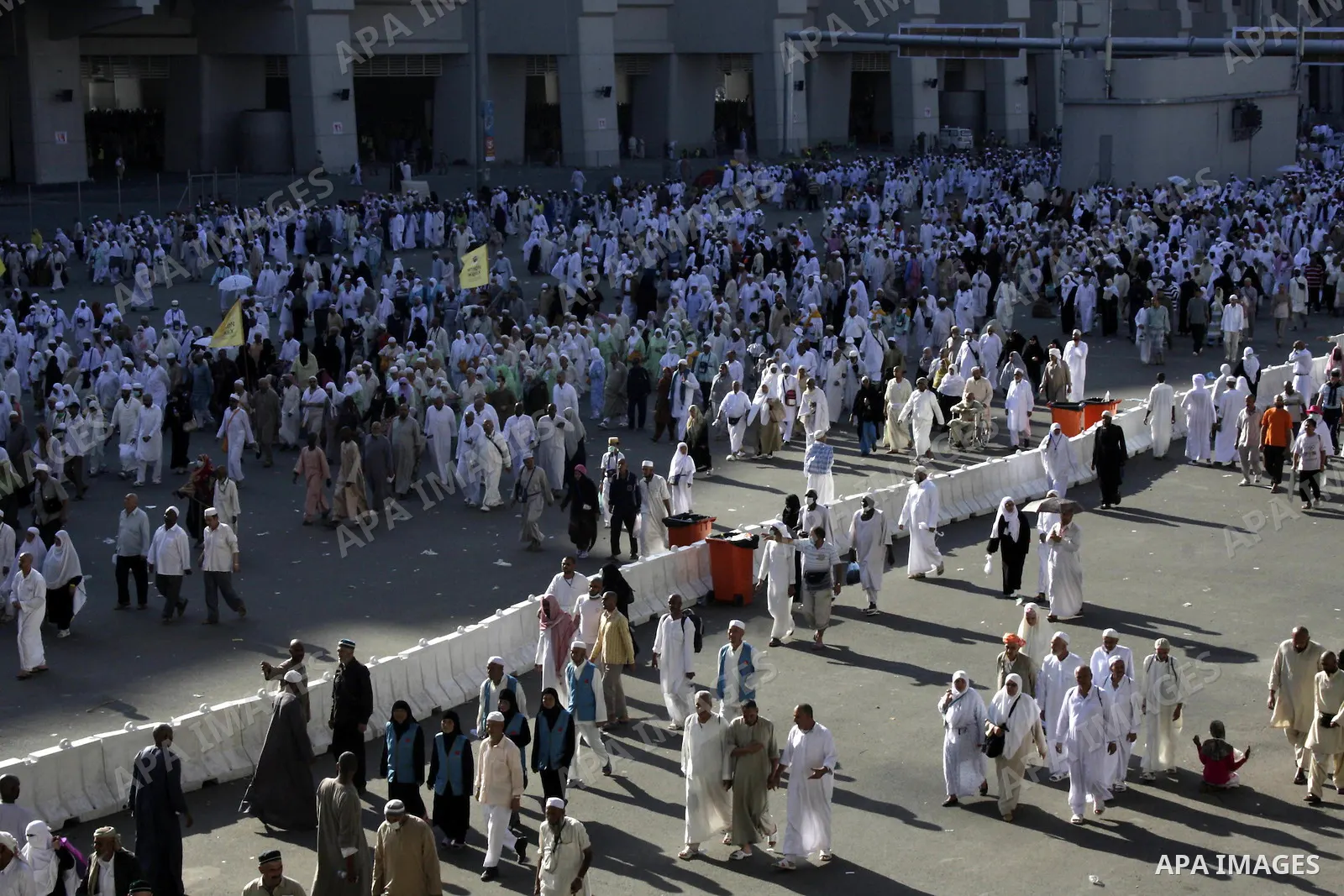 Muslim pilgrims walk near Mount Arafat, southeast of the Saudi city of Mecca on November 28, 2009. Some 2.5 million Muslims from more than 160 countries converge annually on the Islamic cities of Mecca and Medina in west...