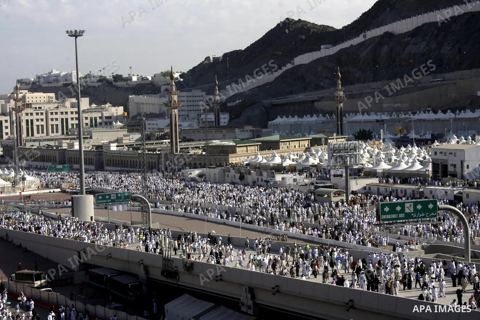 Muslim pilgrims walk near Mount Arafat, southeast of the Saudi city of Mecca on November 28, 2009. Some 2.5 million Muslims from more than 160 countries converge annually on the Islamic cities of Mecca and Medina in west...