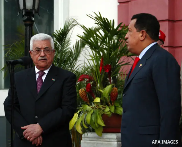 Venezuelan President Hugo Chavez receives Palestinian President Mahmoud Abbas in the Venezuelan capital on November 27, 2009 in Caracas, Venezuela. The leaders met to discuss opening an embassy and stationing an ambassad...