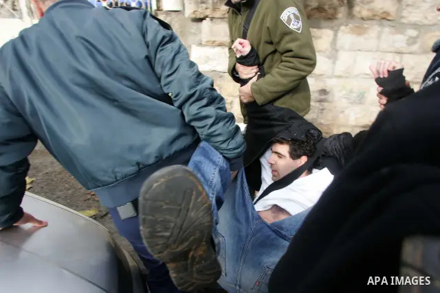 Israeli police arrest demonstrators during a demonstration against Jewish settlements and in solidarity with Palestinian families who were evicted from their homes in the Sheikh Jarrah neighbourhood of East Jerusalem Dec...