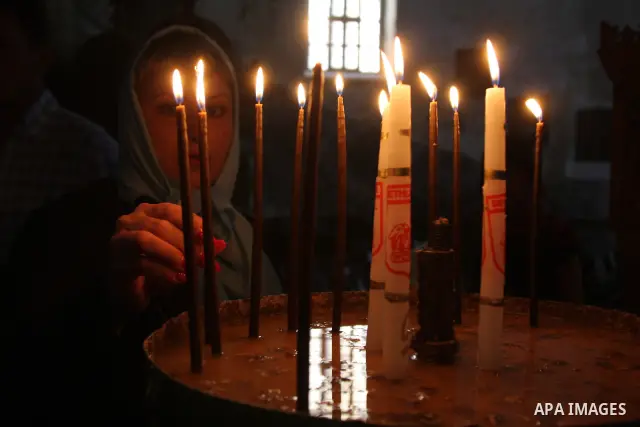 A Christian worshippers during Christmas celebrations in the West Bank city of Bethlehem on December 24, 2009. Thousands of Christians are flocking to the biblical city of Bethlehem, the traditional birthplace of Jesus C...