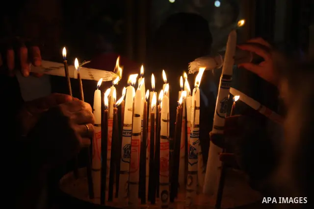A Christian worshippers during Christmas celebrations in the West Bank city of Bethlehem on December 24, 2009. Thousands of Christians are flocking to the biblical city of Bethlehem, the traditional birthplace of Jesus C...