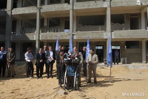 Coordinator of Humanitarian Affairs in the United Nations James Rowley speaks during a press conference at school in Jabalya in the northern Gaza Strip on Nov. 21, 2013. James Rowley announced the suspension of projects...
