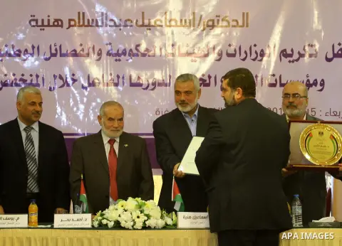 Palestinian Prime Minister in Gaza Strip Ismail Haniyeh, attends attends a honoring ceremony in Gaza City on January 15, 2014. Photo by Mohammed Asad