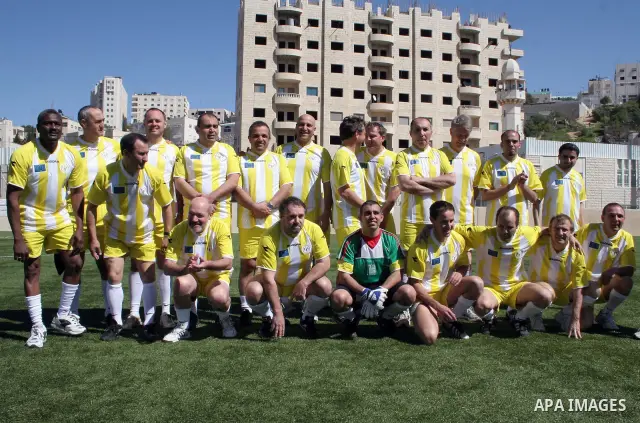 A friendly football match between Palestinian players and foreign diplomats in the West Bank city of Hebron on March 21, 2010. Photo by Najeh Hashlamoun