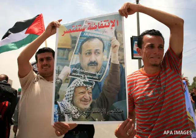 Palestinians take part in a protest near Erez crossing between Israel and the northern Gaza Strip April 21, 2010, against orders introduced by the Israeli military that human rights activists said last week could make al...