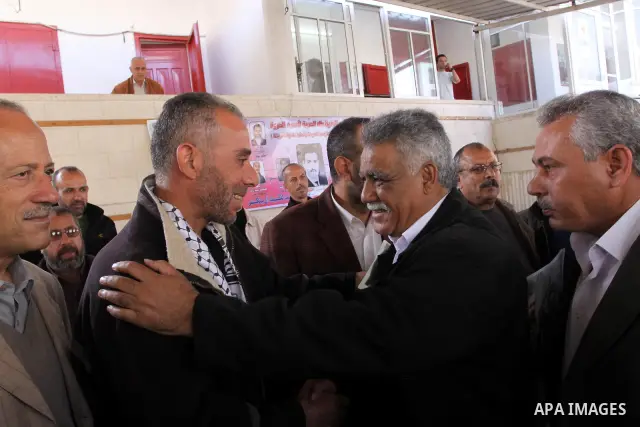 Released Palestinian prisoner Ahmad Sabah is welcomed by Palestinians after his arrival in Gaza City April 22, 2010. According to a Palestinian official in Gaza, Sabah, originally from the West Bank town of Tulkarm, was...