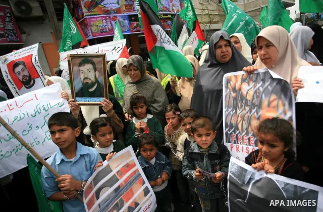 Palestinian Hamas supporters take part in a protest in Gaza City April 22, 2010, calling for the release of Palestinian prisoners from Israeli jails. According to Waed, the Palestinian Prisoners Association, about 7,500...