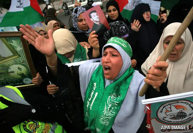 Palestinian Hamas supporters take part in a protest in Gaza City April 22, 2010, calling for the release of Palestinian prisoners from Israeli jails. According to Waed, the Palestinian Prisoners Association, about 7,500...