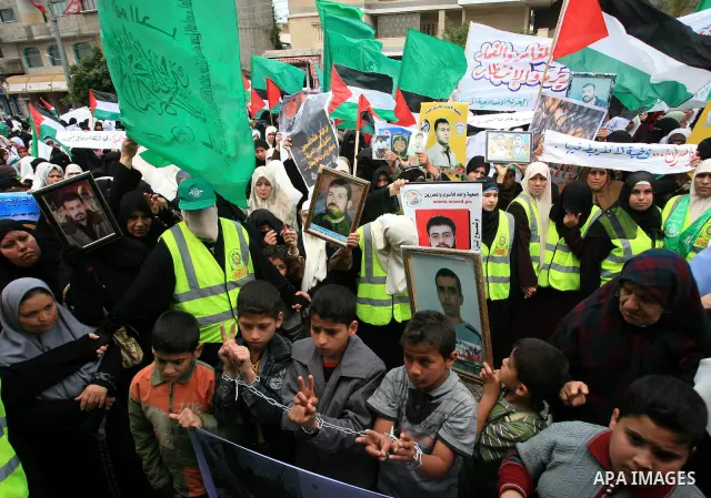 Palestinian Hamas supporters take part in a protest in Gaza City April 22, 2010, calling for the release of Palestinian prisoners from Israeli jails. According to Waed, the Palestinian Prisoners Association, about 7,500...