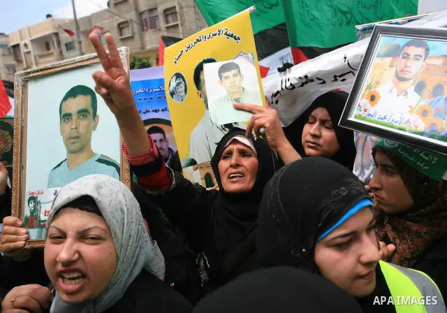 Palestinian Hamas supporters take part in a protest in Gaza City April 22, 2010, calling for the release of Palestinian prisoners from Israeli jails. According to Waed, the Palestinian Prisoners Association, about 7,500...
