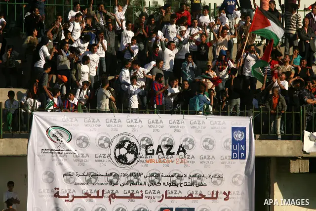 Palestinians take part in the opening ceremony of Gaza's World Cup in Gaza City on May 2, 2010. The Gaza Strip kicked off its own version of the World Cup with teams of Palestinian footballers and foreigners--mostly aid...