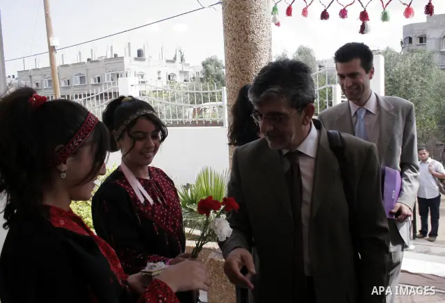 The Greece General consul is welcomed by Palestinians during his visiting to Ata'a Charity Association in the northern Gaza Strip town of Beit Hanoun on May 20,2010.. Photo by Yousef Deeb