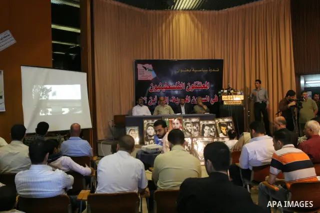 Palestinians take part in a conference in Gaza City on May 20,2010 calling the Egyptian authorities to release Palestinian prisoners. Photo by Mohammed Asad