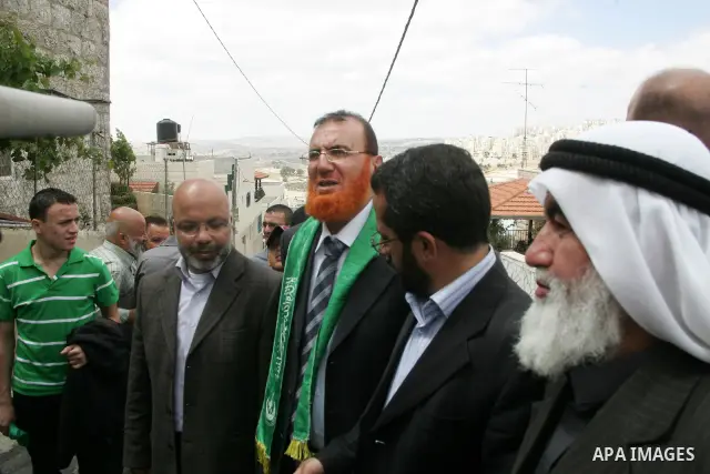 Palestinian Hamas lawmaker Mohammed Abu Tir is greeted after his release from Israeli prison, at his house in the village of Tsur Baher, in East Jerusalem May 20, 2010. Abu Tir was arrested following abducted Israeli sol...