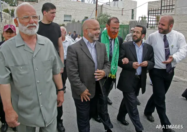 Palestinian Hamas lawmaker Mohammed Abu Tir is greeted after his release from Israeli prison, at his house in the village of Tsur Baher, in East Jerusalem May 20, 2010. Abu Tir was arrested following abducted Israeli sol...