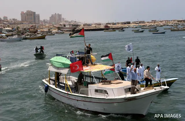 Palestinian Hamas naval policemen patrol off the coast of Gaza City on May 29, 2010 in preparation for the arrival of the "Freedom Flotilla". Organisers of the aid flotilla bound for the Gaza Strip in defiance of an Isra...