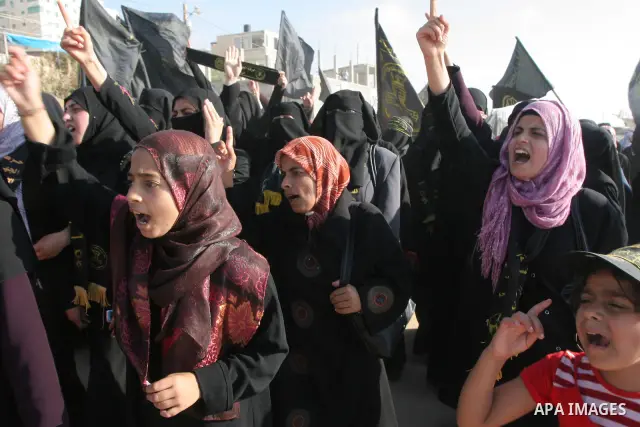 Palestinian Islamic Jihad supporters take part in anti-Israeli protest at the port of Gaza City on May 31, 2010. At least 10 activists were killed in an Israeli naval takeover on Monday of a Gaza-bound aid convoy, an Isr...