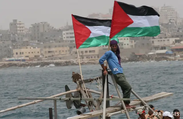 Palestinians ride boats during a protest at the Gaza Seaport against Israel's interception of of Gaza-bound ships, June 3, 2010. Israel, deflecting a U.N. demand for an international investigation, proposed on Thursday a...