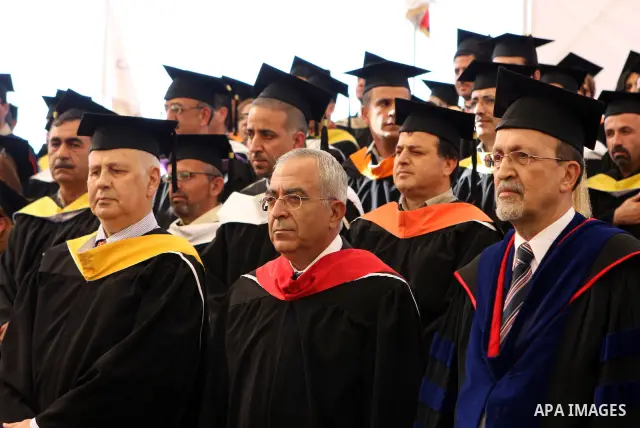 Palestinian Prime Minister Salam Fayyad attends the 35th Graduation Ceremony for students of Birzeit University near the West Bank city of Ramallah on June 5, 2010. Photo by Eyad Jadallah