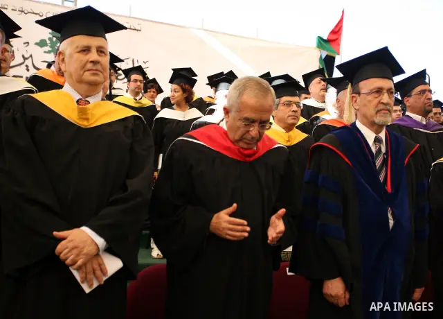 Palestinian Prime Minister Salam Fayyad attends the 35th Graduation Ceremony for students of Birzeit University near the West Bank city of Ramallah on June 5, 2010. Photo by Eyad Jadallah