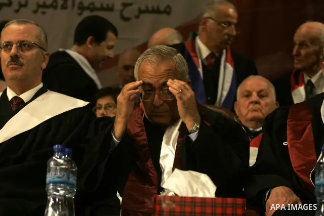 Palestinian Prime Minister Salam Fayyad attends the 33th Graduation Ceremony for students of Al-Najah National University in the West Bank city of Nablus on June 6, 2010. Photo by Wagdi Eshtayah