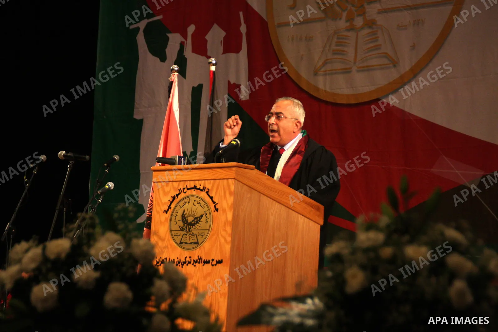 Palestinian Prime Minister Salam Fayyad attends the 33th Graduation Ceremony for students of Al-Najah National University in the West Bank city of Nablus on June 6, 2010. Photo by Wagdi Eshtayah