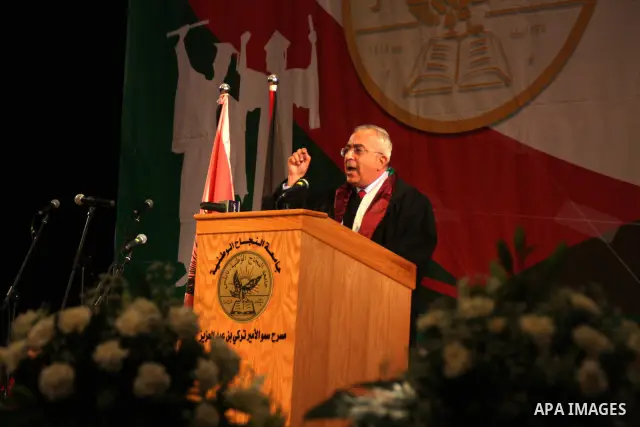 Palestinian Prime Minister Salam Fayyad attends the 33th Graduation Ceremony for students of Al-Najah National University in the West Bank city of Nablus on June 6, 2010. Photo by Wagdi Eshtayah