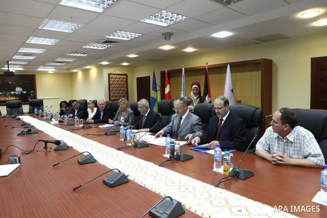 Palestinian Prime Minister Salam Fayyad attends signing agreement ceremony with the World Bank for Municipalities development in the West Bank and Gaza strip in the West Bank city of Ramallah on June 10, 2010. Photo by M...