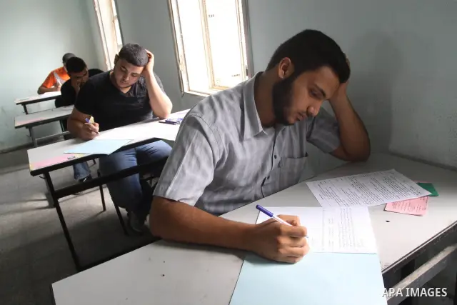 Students on the first day of the General Secondary Exams in Palestine School in Gaza City June 12, 2010. Photo by Mohammed Asad