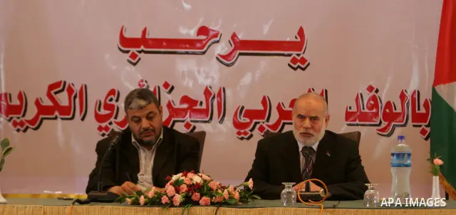 The spokesman of the Palestinian Parliament, Ahmed Bahr honors the Algerian delegation members in Gaza, June 14, 2010. The Algerian delegation entered Gaza on Saturday during a visit to Gaza which has been under the Isra...