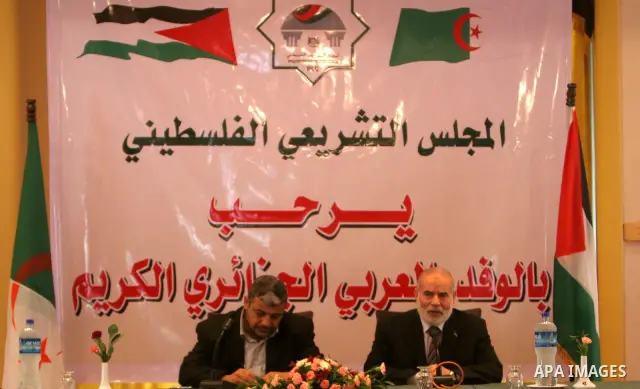 The spokesman of the Palestinian Parliament, Ahmed Bahr honors the Algerian delegation members in Gaza, June 14, 2010. The Algerian delegation entered Gaza on Saturday during a visit to Gaza which has been under the Isra...