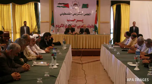 The spokesman of the Palestinian Parliament, Ahmed Bahr honors the Algerian delegation members in Gaza, June 14, 2010. The Algerian delegation entered Gaza on Saturday during a visit to Gaza which has been under the Isra...