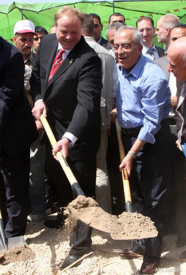 Palestinian Prime Minister Salam Fayyad with the German Minister of Economic Cooperation and Development, Dirk Nipple, Launch Project starch wastewater plant in the West Bank city of Nablus on June 19, 2010. Photo by Wag...