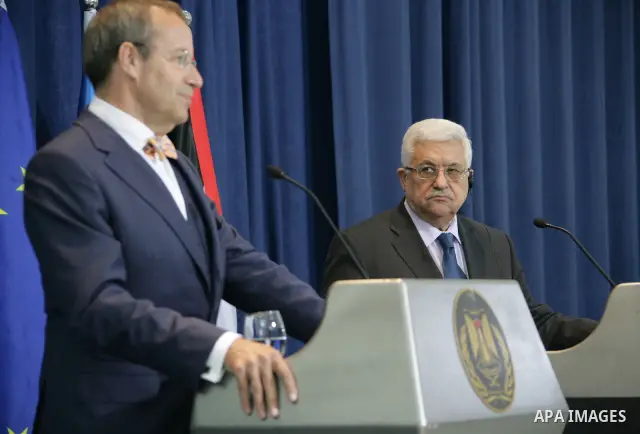 Palestinian president Mahmoud Abbas and Estonia's President Toomas Hendrik Ilves give a joint press conference at the Palestinian President headquarters in the West Bank city of Ramallah on June 29, 2010. Photo by Thaer...