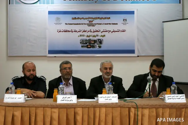 Palestinian Justice minister, Mohammed Al-Ghoul (C) participates in a conference in Gaza city on June 30,2010 Photo by Mohammed Asad
