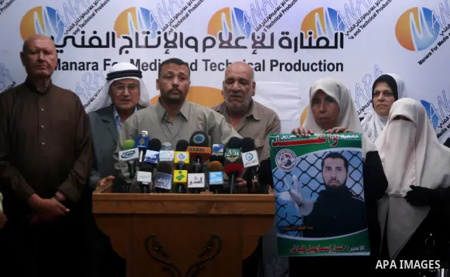Relatives of Palestinian prisoners who jailed in Israeli prisons take part in a press conference in Gaza City on July 30, 2010. Photo by Ali Jadallah