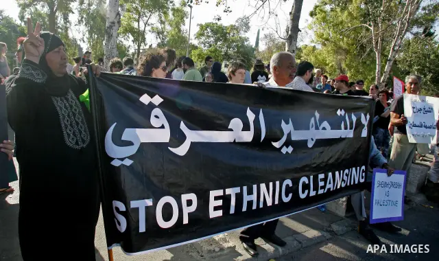 Israeli Peace activists, protesting in solidarity with Palestinians from Shiek Jarrah, the East Jerusalem neighborhood, 02 July 2010, against the Israeli settlers who took over Palestinian houses in neighborhood. Photo b...