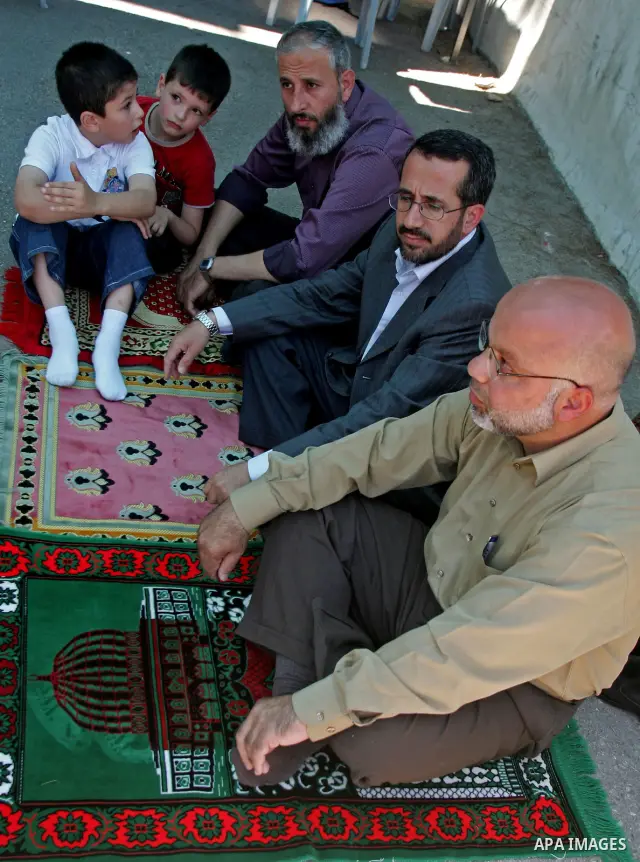 Palestinian lawmakers from Hamas movements Ahmed Atwan, Khaled Abu Arafieh and Muhammad Totah attending the Friday prayer at the International Red Cross Committee (ICRC), headquarter in East Jerusalem July 2,2010. The Ha...