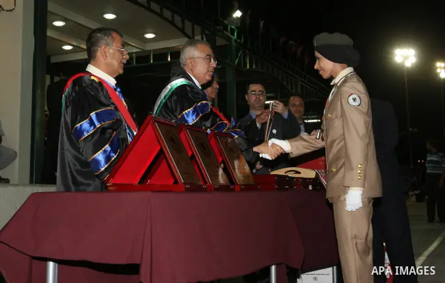 Palestinian Prime Minister Salam Fayyad during the third graduation ceremony of diploma students of security sciences and police sciences in the West Bank city of Jericho on July 4,2010. . Photo by Mustafa Abu Dayeh / Po...