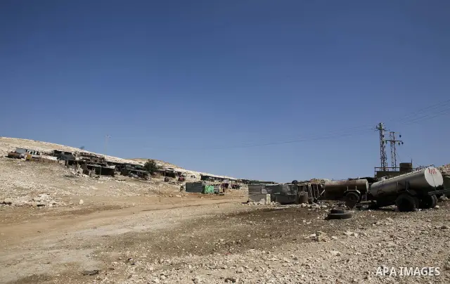 General view to the Palestinian Bedouin tents on the road between Jericho and Ramallah on July 15, 2010 as Palestinian bedouins live hard life in the West Bank. Photo by Eyad Jadallah